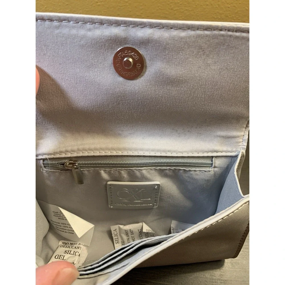 CXL by Christian Lacroix Clutch Wristlet Womens Small Silver Park Smooth‎ Logo